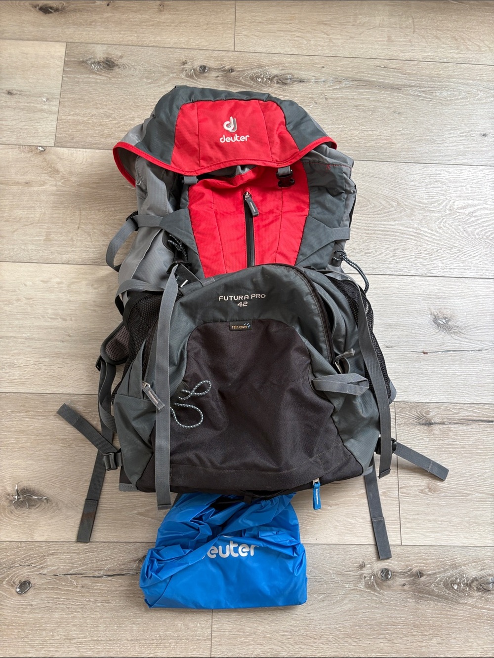 EUC Deuter Futura Pro 42 Men’s Hiking Backpack in Red and Gray rain cover